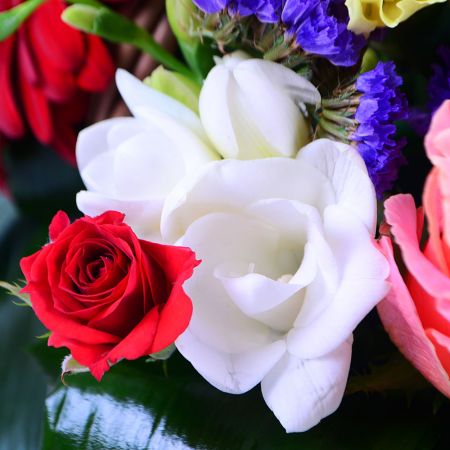 Nice and beautiful bouquet in a basket - perfect gift