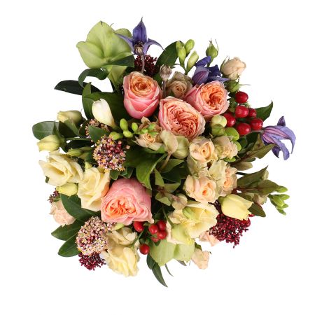 oasis, cream rose (5 pcs.), red skimmia, heleborus, cream eustoma (2 pcs.), red hypericum, cream bush rose (2 pcs.), white freesia (2 pcs.), clematis, packaging, ribbon